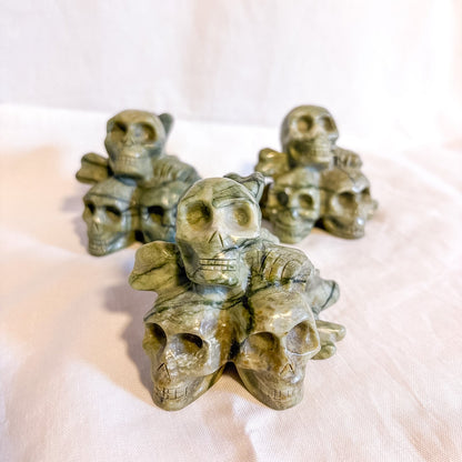 Serpentine skull n bones crystal carving