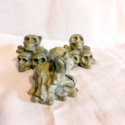Serpentine skull n bones crystal carving