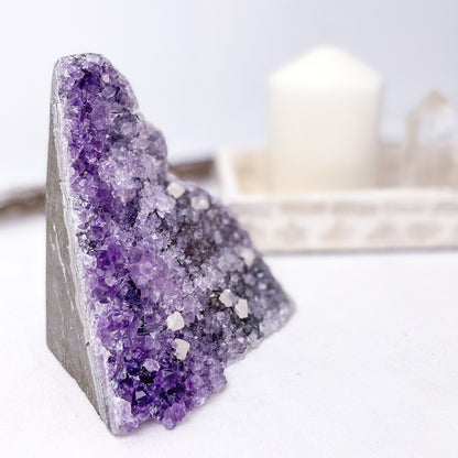 Amethyst + Calcite crystal flat base cluster