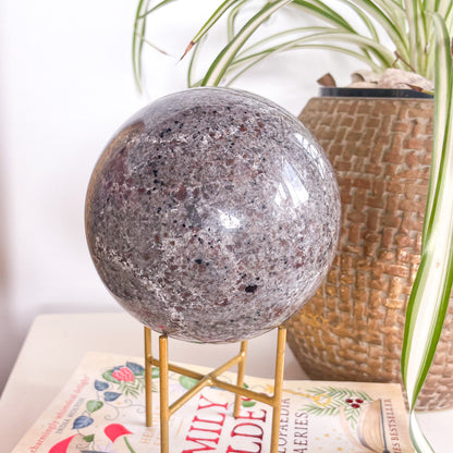 Crystal UV reactive Yooperlite polished XL sphere with gold stand