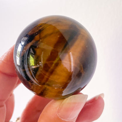 Tiger eye crystal sphere