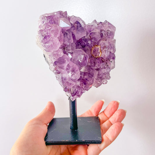 Amethyst heart crystal cluster on stand 640g