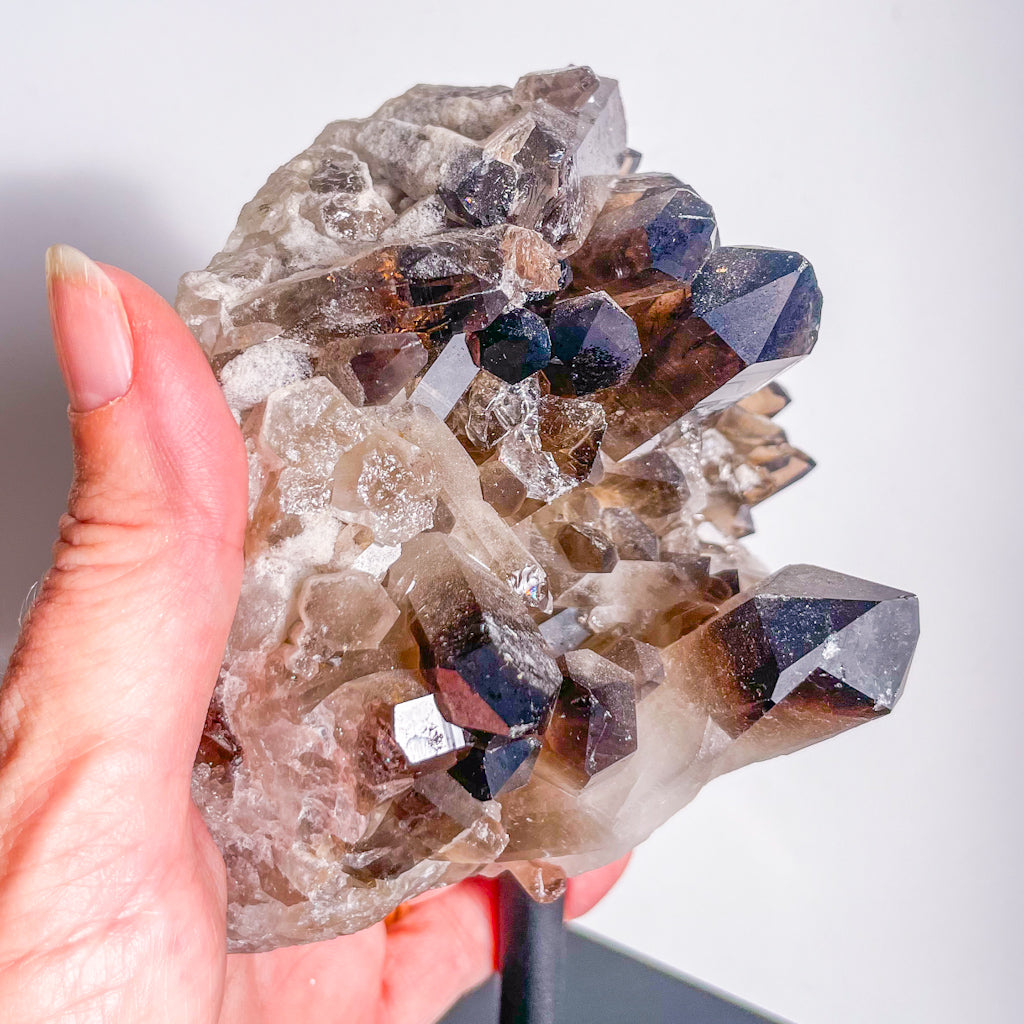 Smoky quartz crystal cluster on stand 730g