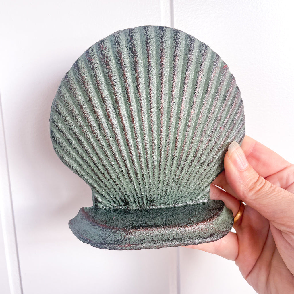 Shell cast iron vintage bookend / door stop