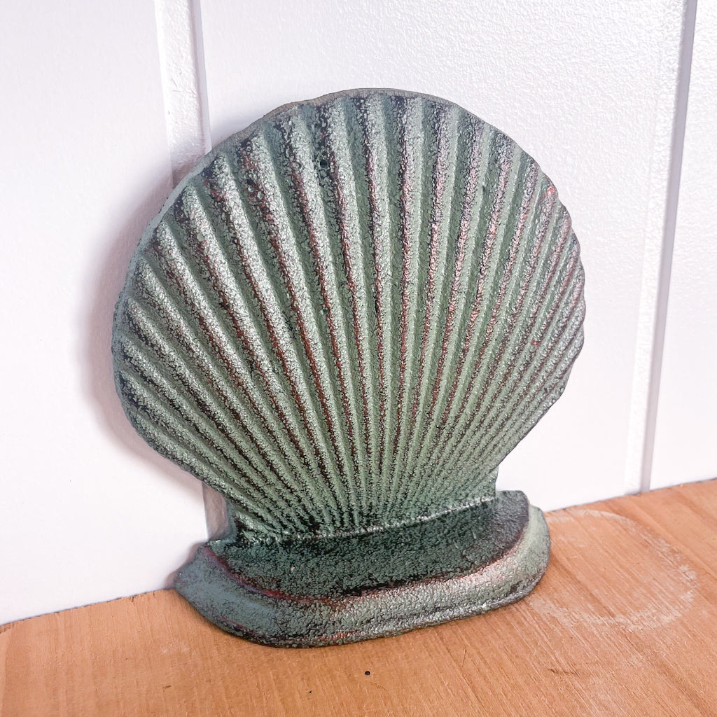 Shell cast iron vintage bookend / door stop