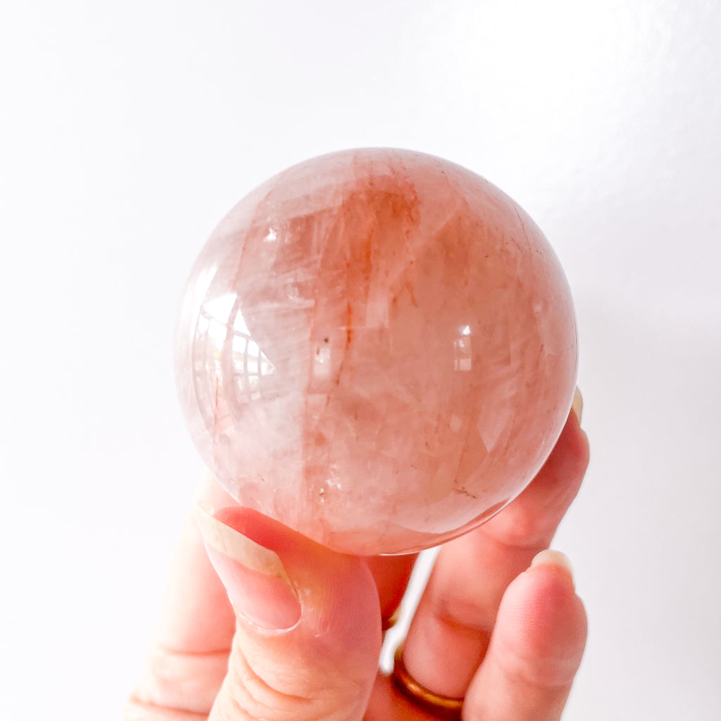 Fire quartz crystal sphere