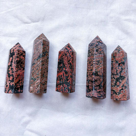 Red snowflake obsidian crystal tower