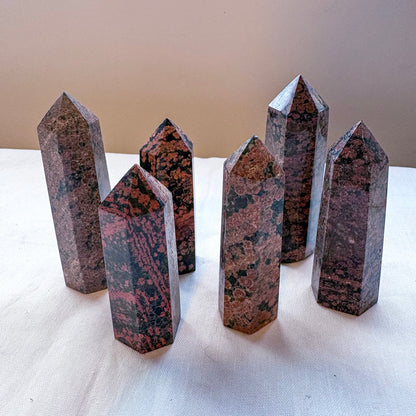 Red snowflake obsidian crystal tower