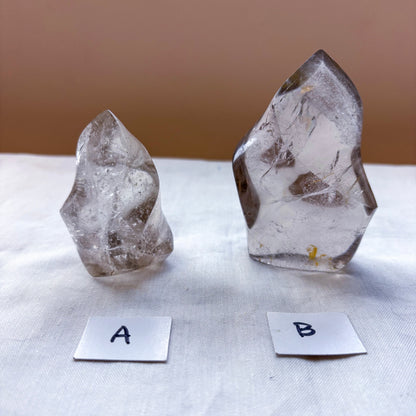 Clear quartz crystal flame statue