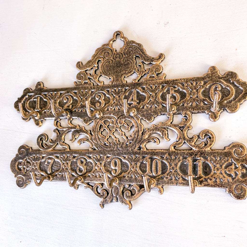 Cast iron ornate hotel key numbers vintage wall hooks