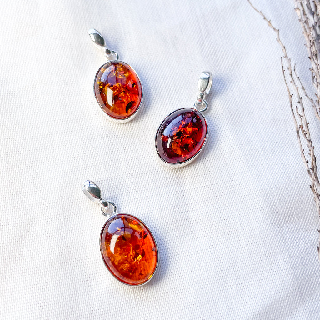 Baltic Amber crystal sterling silver pendant with inclusions