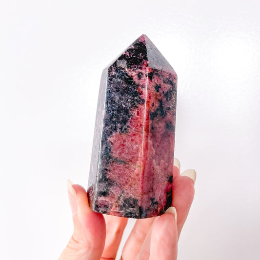 Pink rhodonite crystal tower - compassion