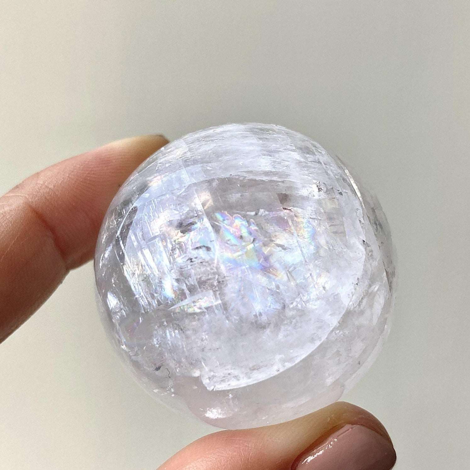 Clear optical calcite with rainbows polished sphere crystal ball
