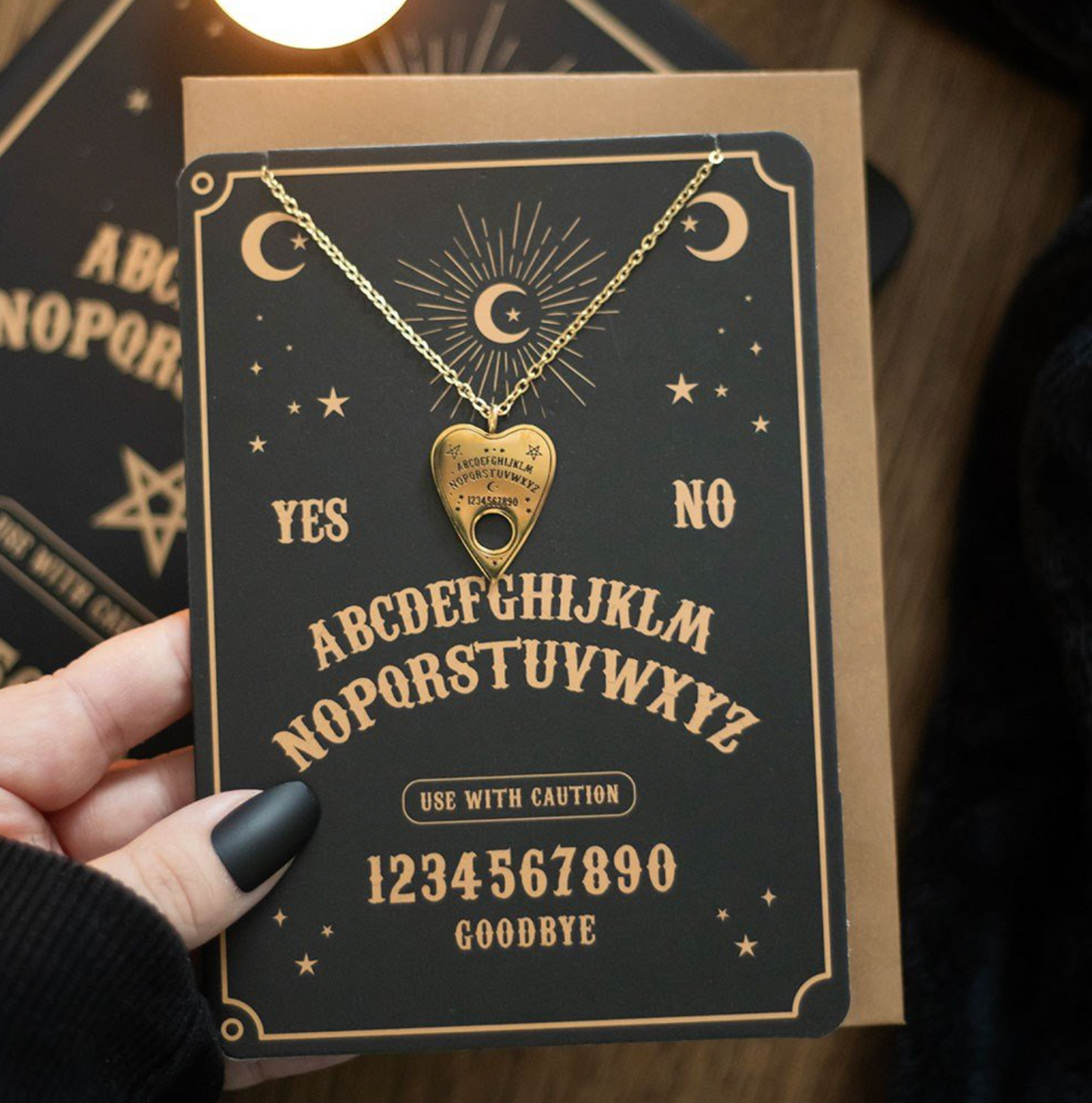 Ouija planchette necklace and greeting card