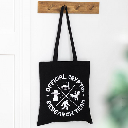 Space alien or Cryptid team tote bag
