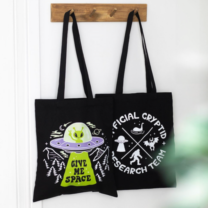 Space alien or Cryptid team tote bag