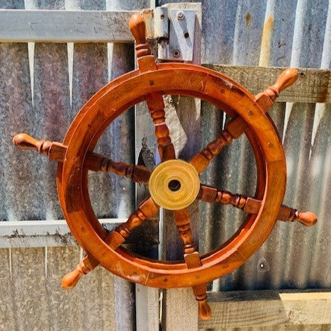 Antique coastal decor boat wheel brass & wood statue