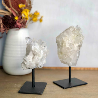 Clear quartz crystal cluster with statue stand - various