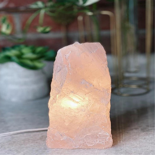 Rose quartz crystal lamp light