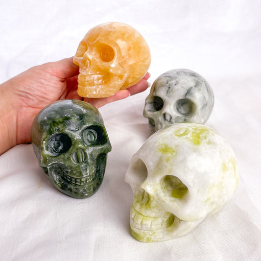 Crystal hand carved skull statue L - calcite or serpentine