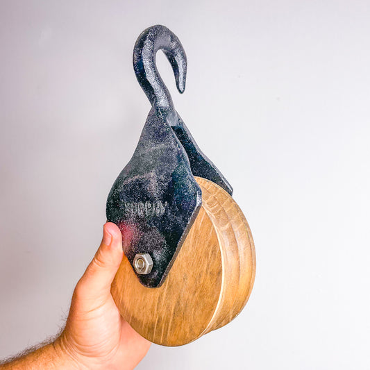 Vintage cast iron and wood pulley with hook