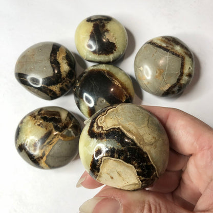 Dragons egg crystal polished palm stone