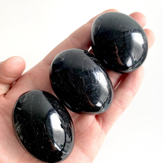 Black tourmaline crystal palm stone