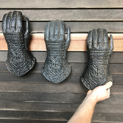 Vintage life-size knight gauntlet hand cast iron wall hanging
