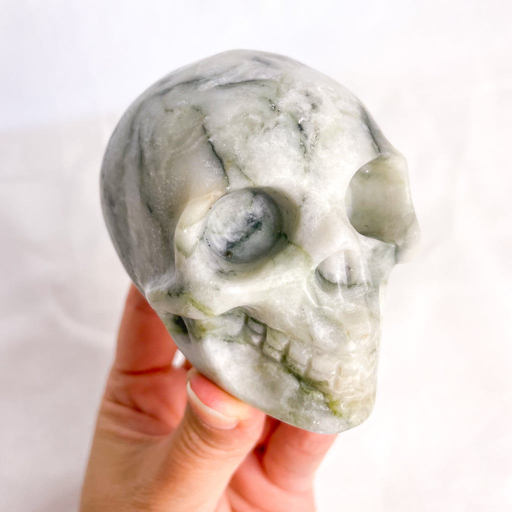 Crystal hand carved skull statue L - calcite or serpentine