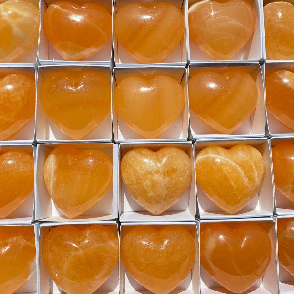 Orange calcite crystal heart large