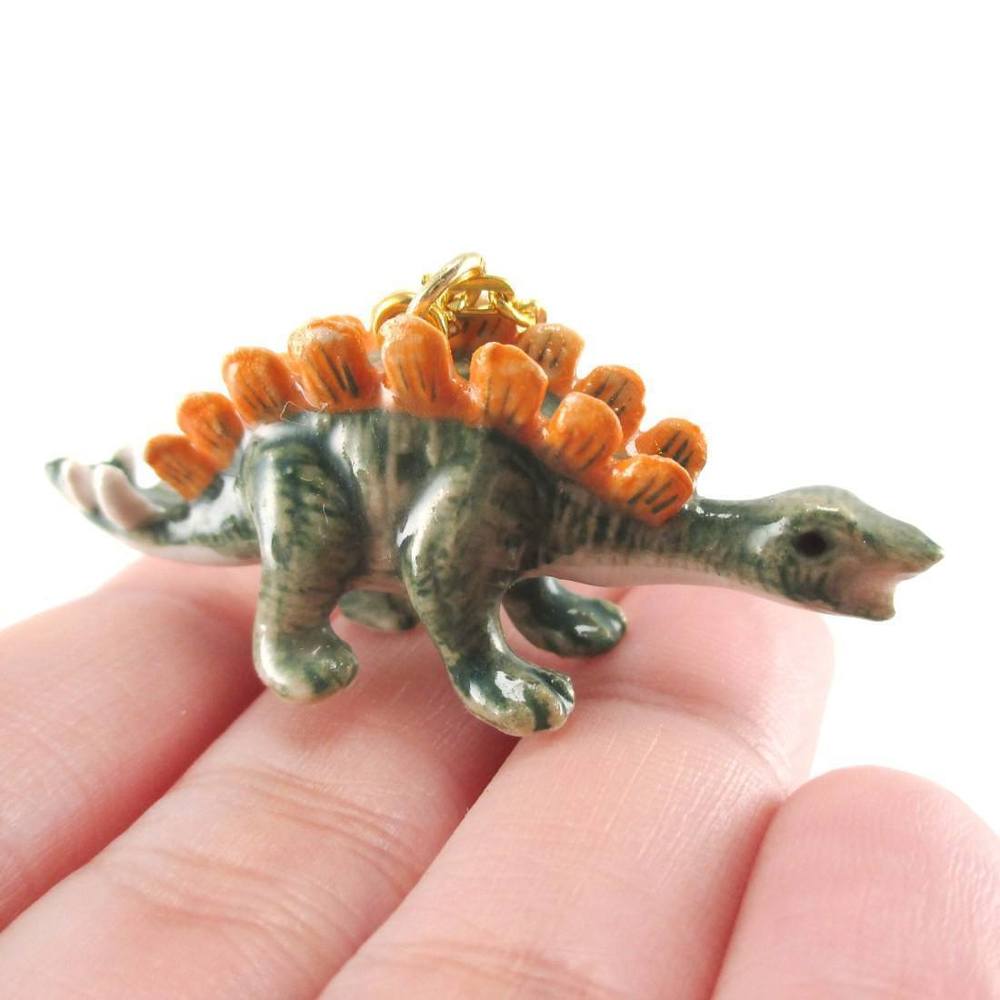 Cute Hand painted stegosaurus dinosaur porcelain pendant